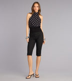 Pantalones capri coquetos de crepé con lunares