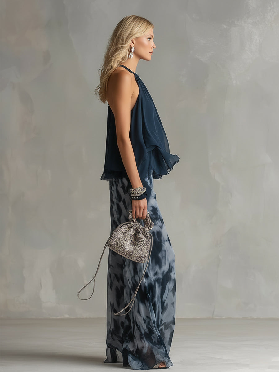 Chloé | Conjunto elegante con top espalda descubierta azul marino y pantalón amplio estampado