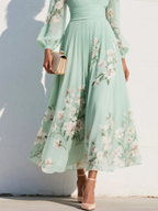 Susane | Vestido maxi plisado de muselina verde menta con estampado floral para mujer