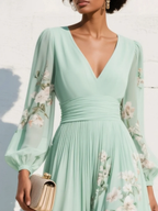 Susane | Vestido maxi plisado de muselina verde menta con estampado floral para mujer