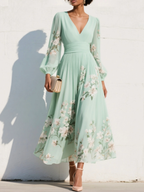 Susane | Vestido maxi plisado de muselina verde menta con estampado floral para mujer