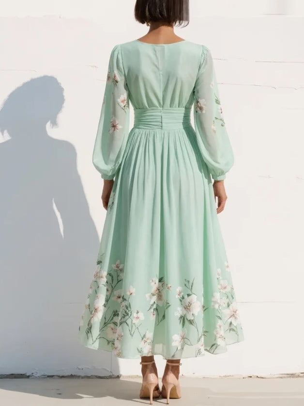 Susane | Vestido maxi plisado de muselina verde menta con estampado floral para mujer