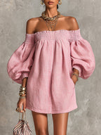 Violeta | Vestido mini trapecio rosa con mangas acampanadas y hombros al aire