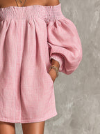 Violeta | Vestido mini trapecio rosa con mangas acampanadas y hombros al aire