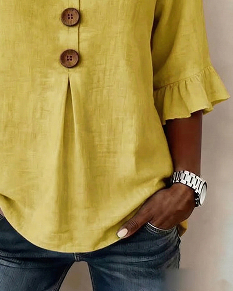 Sofía | Blusa abotonada con volantes