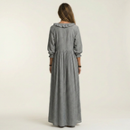 Jordina | Vestido largo a rayas con volantes y mangas acampanadas